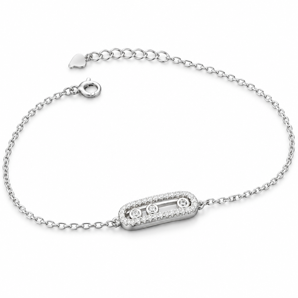 925 sterling silver bracelet with elongated centerpiece and three circular details on a white background