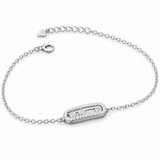 925 sterling silver bracelet with elongated centerpiece and three circular details on a white background