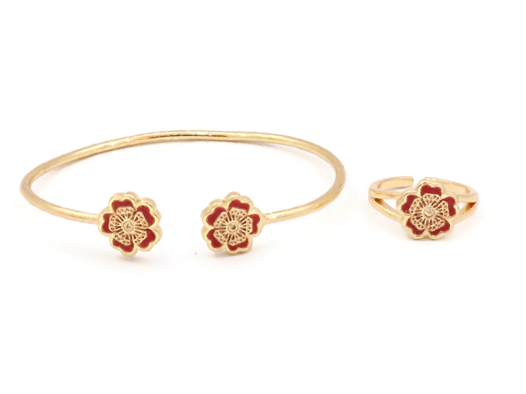 Dual flower design sterling cuff bangle with red ceramic stones.