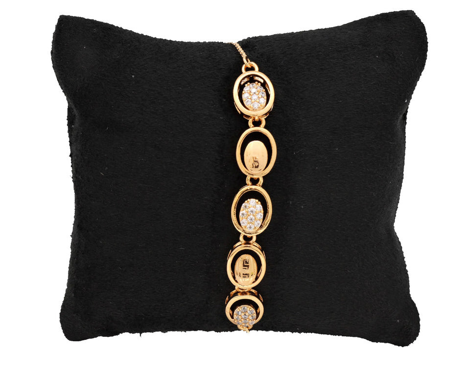 This Spherical Zircon Stonned Bracelet studded with Zircon stones gold plated and beautiful Slider gold platted bracelet.