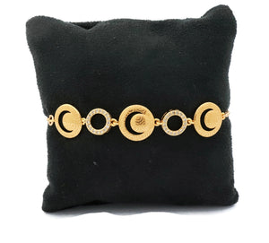 Women's slider bracelet with half moon design studded with zirconia stones