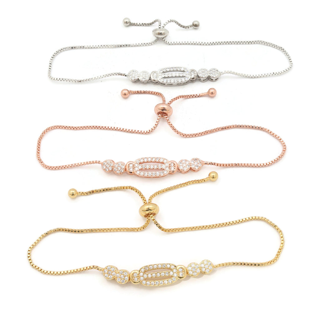 zirconia studded gold, pink gold and rhodium plated slider bracelet