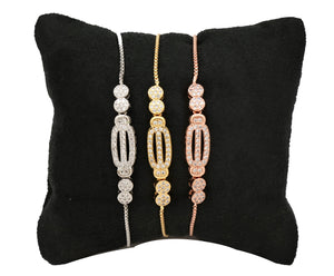 zirconia studded gold, pink gold and rhodium plated slider bracelet