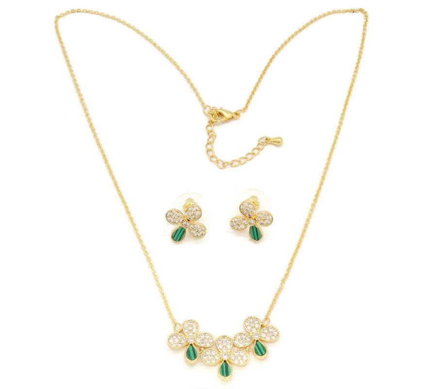The Zircon Studded Elegant flower with green ceramic studds on the mount, Gold Chain pendant with adjustable chain and lobster clasps