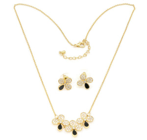 The Zircon Studded Elegant flower with black ceramic studds on the mount, Gold Chain pendant with adjustable chain and lobster clasps