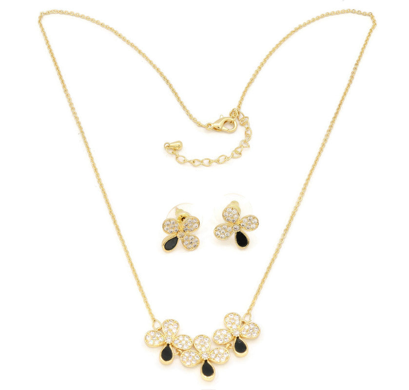 The Zircon Studded Elegant flower with black ceramic studds on the mount, Gold Chain pendant with adjustable chain and lobster clasps