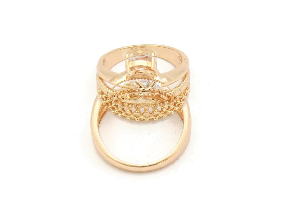 Wedding ring with Zircon stone studded on the mount and criss cross design